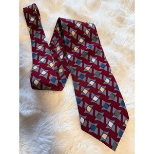 Preowned,Vintage Oscar de la Renta necktie, likely crafted from silk.